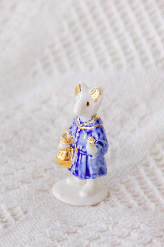 Werling kupiec, rzeźba porcelanowa ze złoceniem