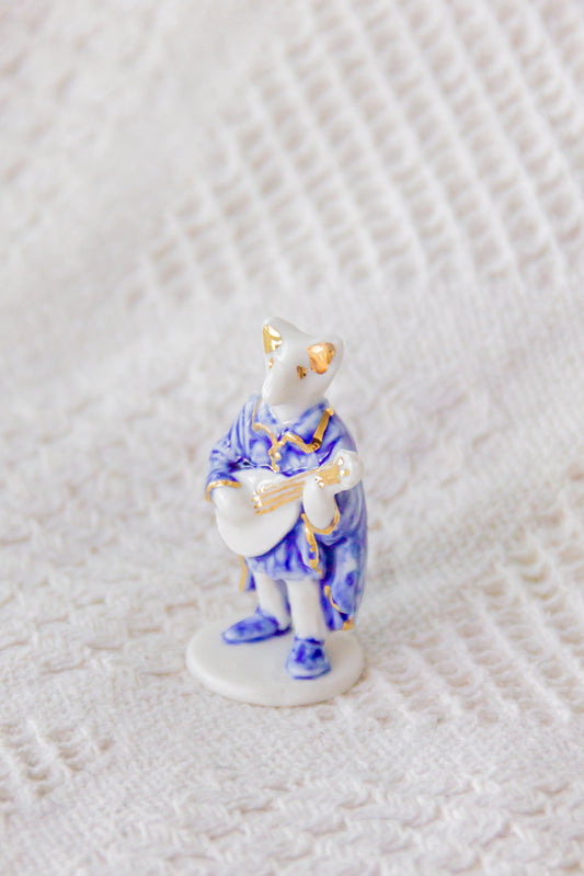 Werling minstrel, rzeźba porcelanowa ze złoceniem