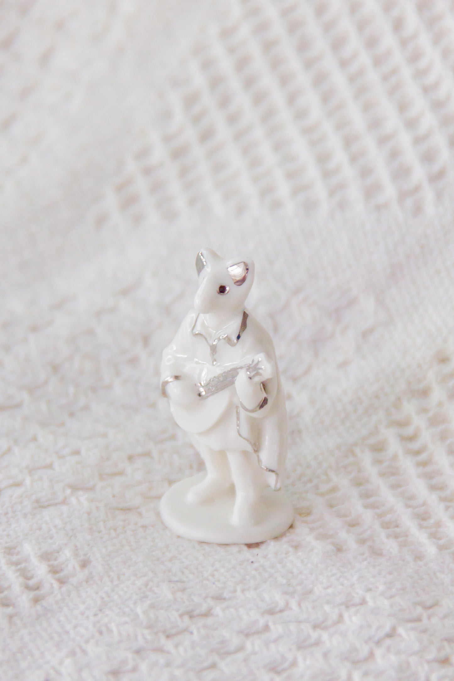 Werling minstrel, rzeźba porcelanowa platynowana