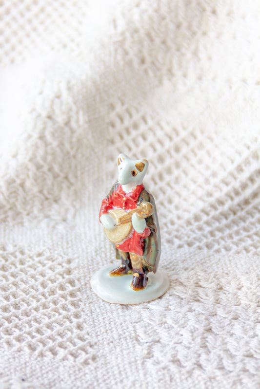 Werling minstrel, rzeźba ceramiczna ze złoceniem