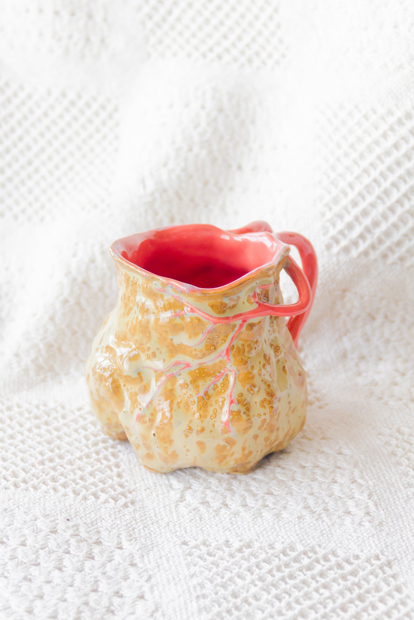 Kubek ceramiczny “Couroupita” brązowo-różowy