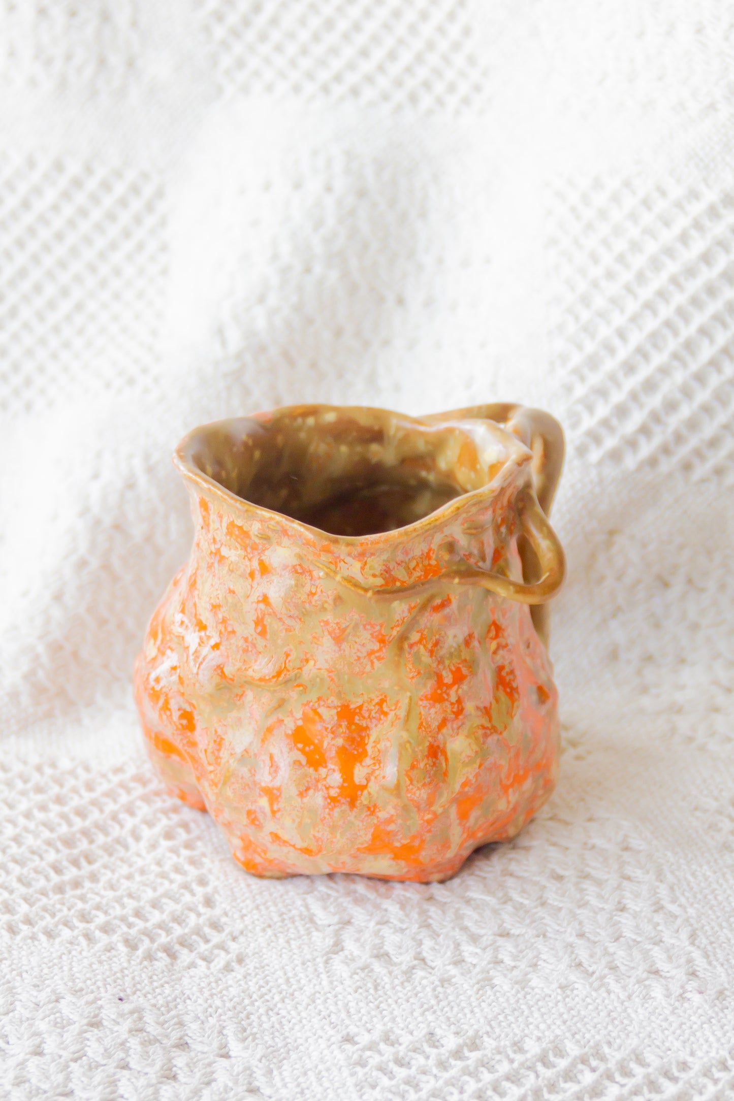 Kubek ceramiczny “Couroupita” brązowo-pomarańczowy