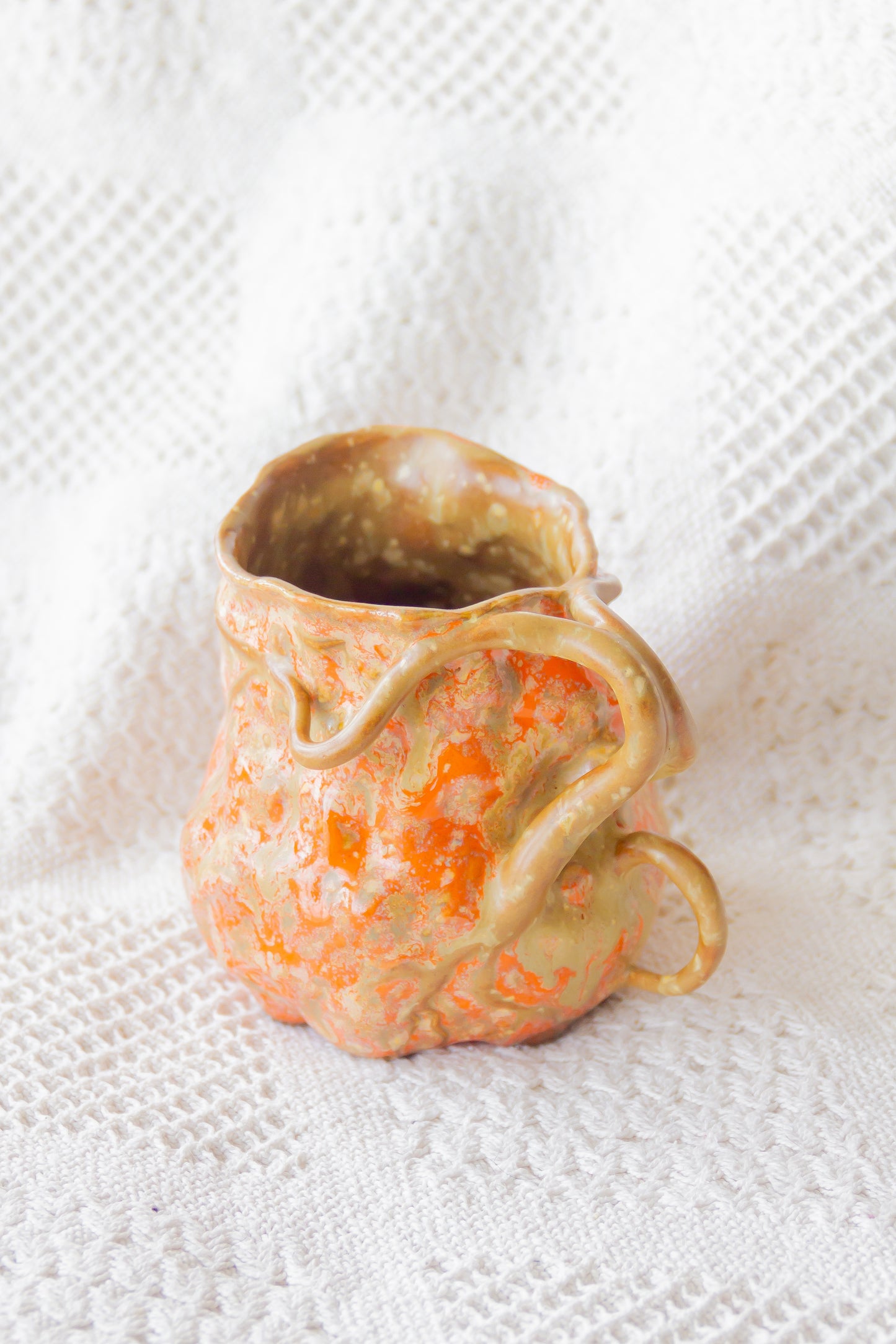 Kubek ceramiczny “Couroupita” brązowo-pomarańczowy