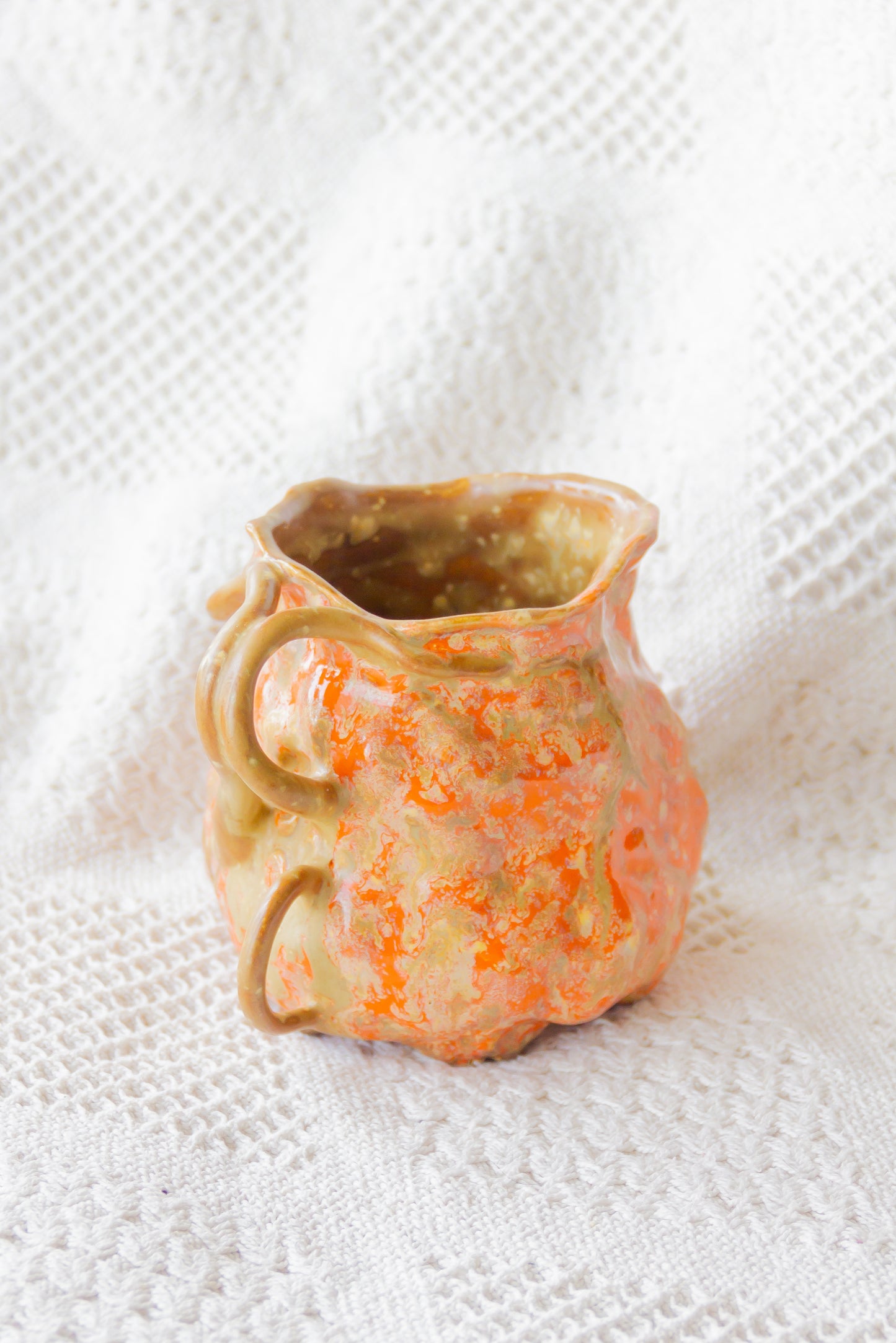 Kubek ceramiczny “Couroupita” brązowo-pomarańczowy