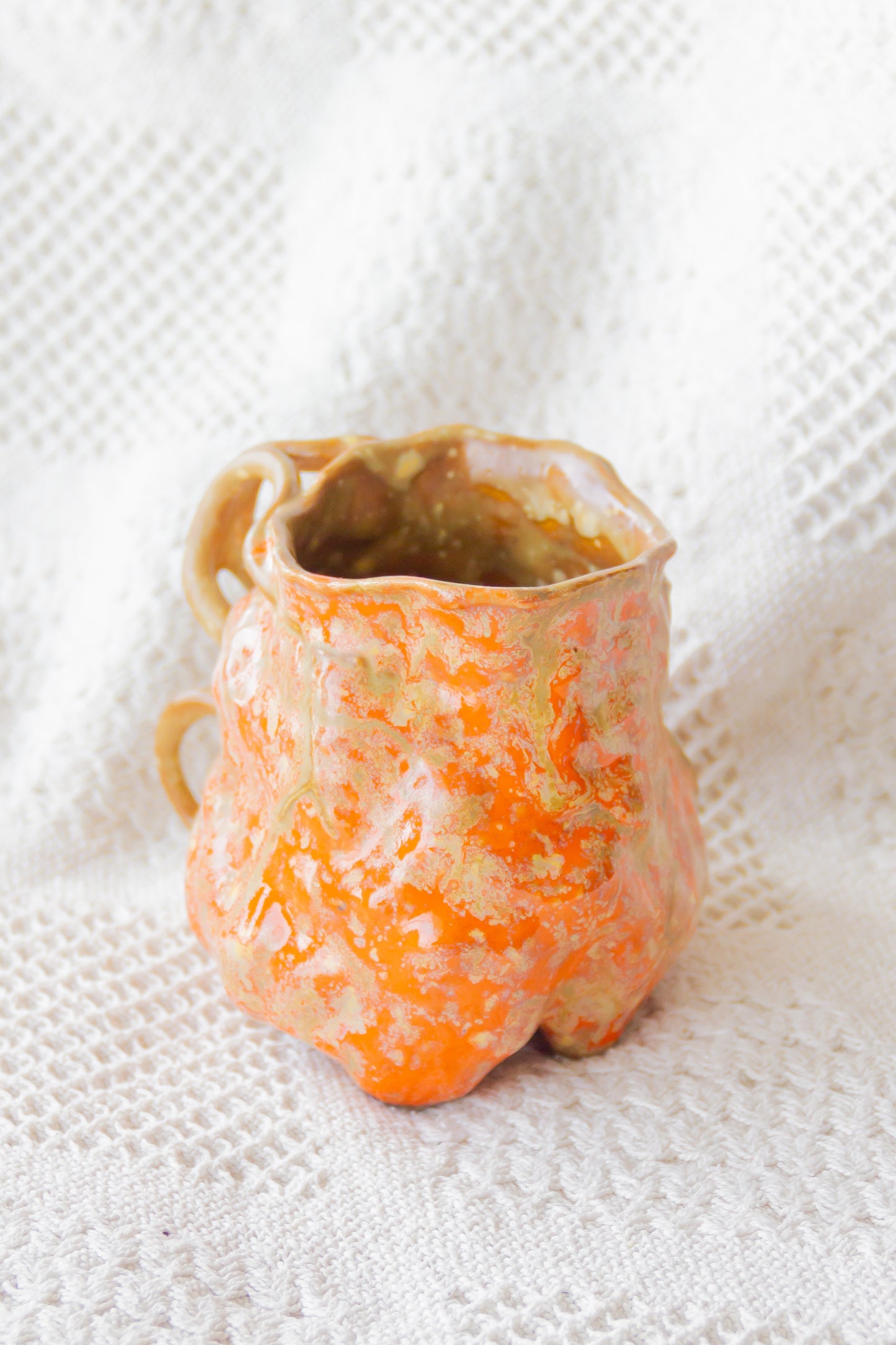 Kubek ceramiczny “Couroupita” brązowo-pomarańczowy