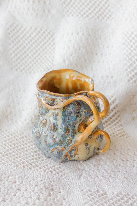 Kubek ceramiczny “Couroupita” brązowo-niebieski