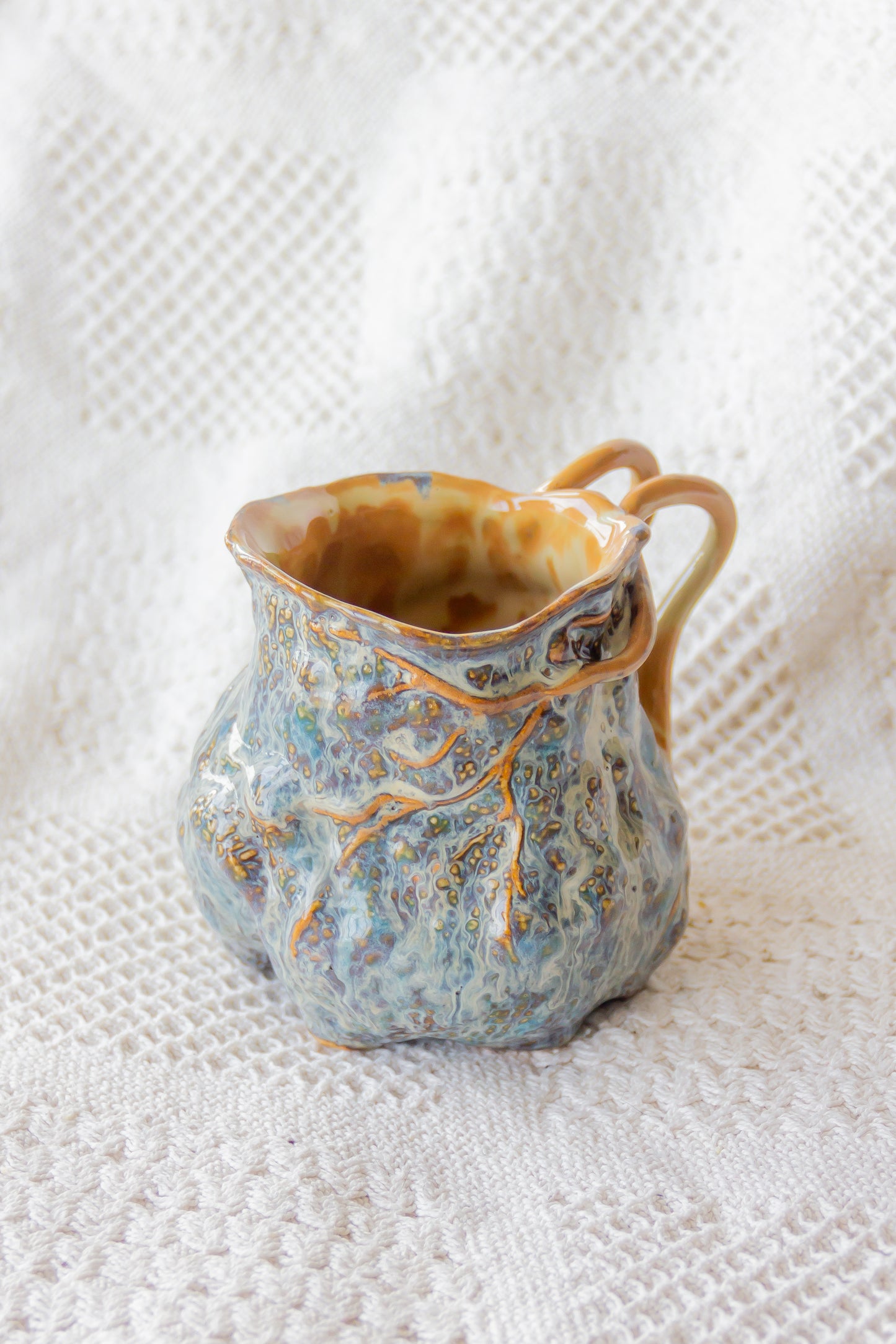 Kubek ceramiczny “Couroupita” brązowo-niebieski