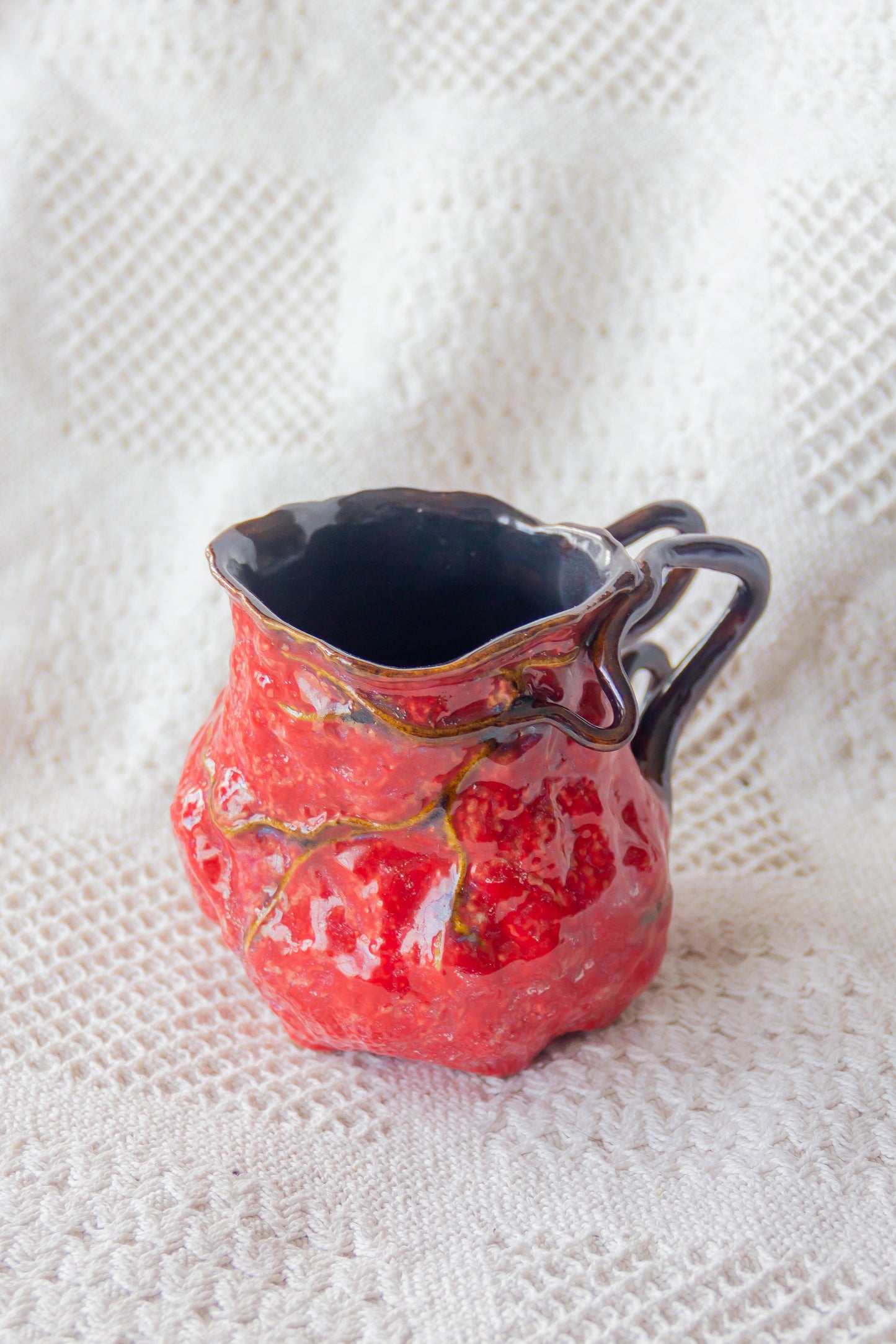 Kubek ceramiczny “Couroupita” czerwono-czarny