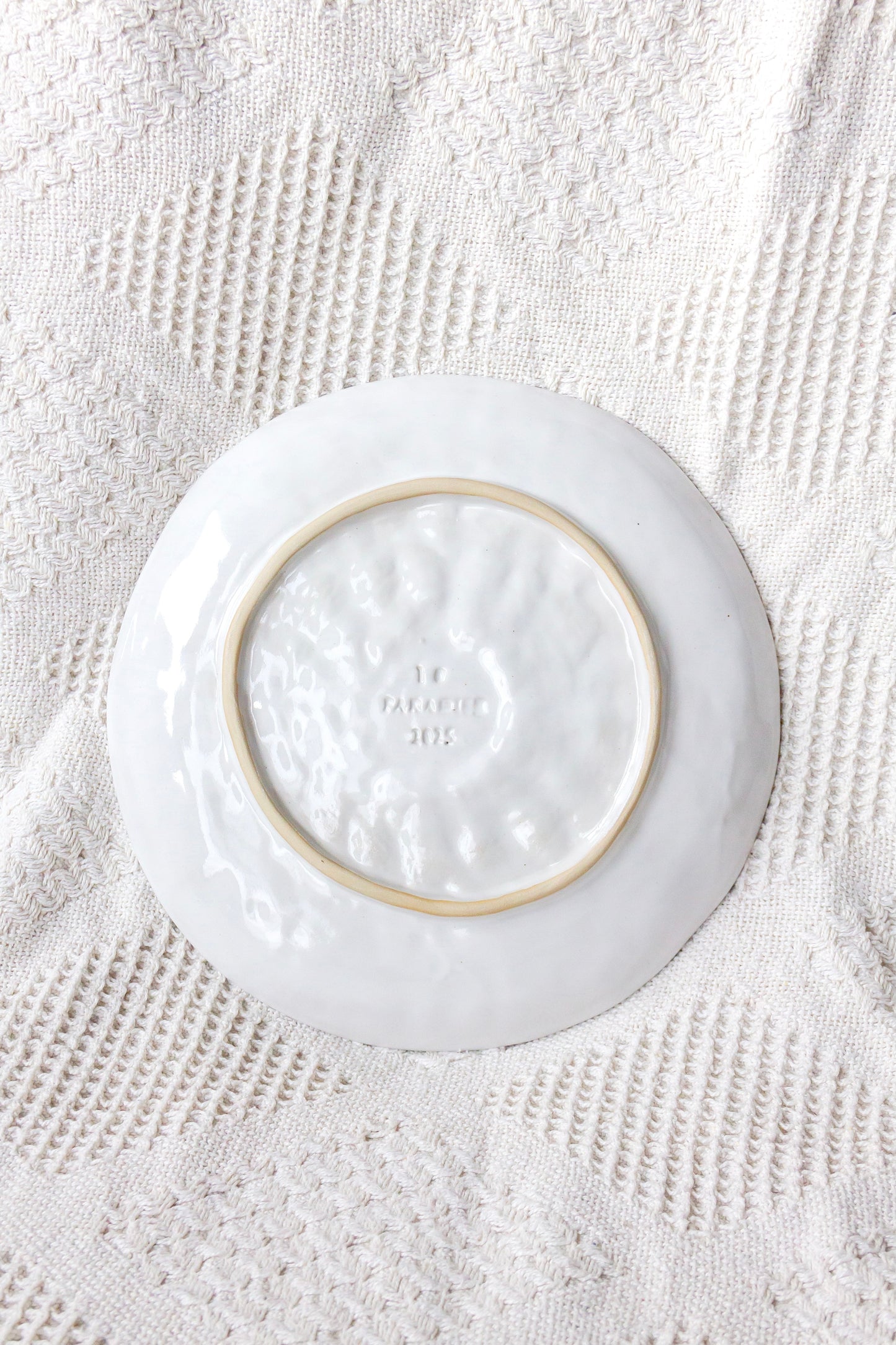 Talerz ceramiczny „Źrenica” biało-zielony