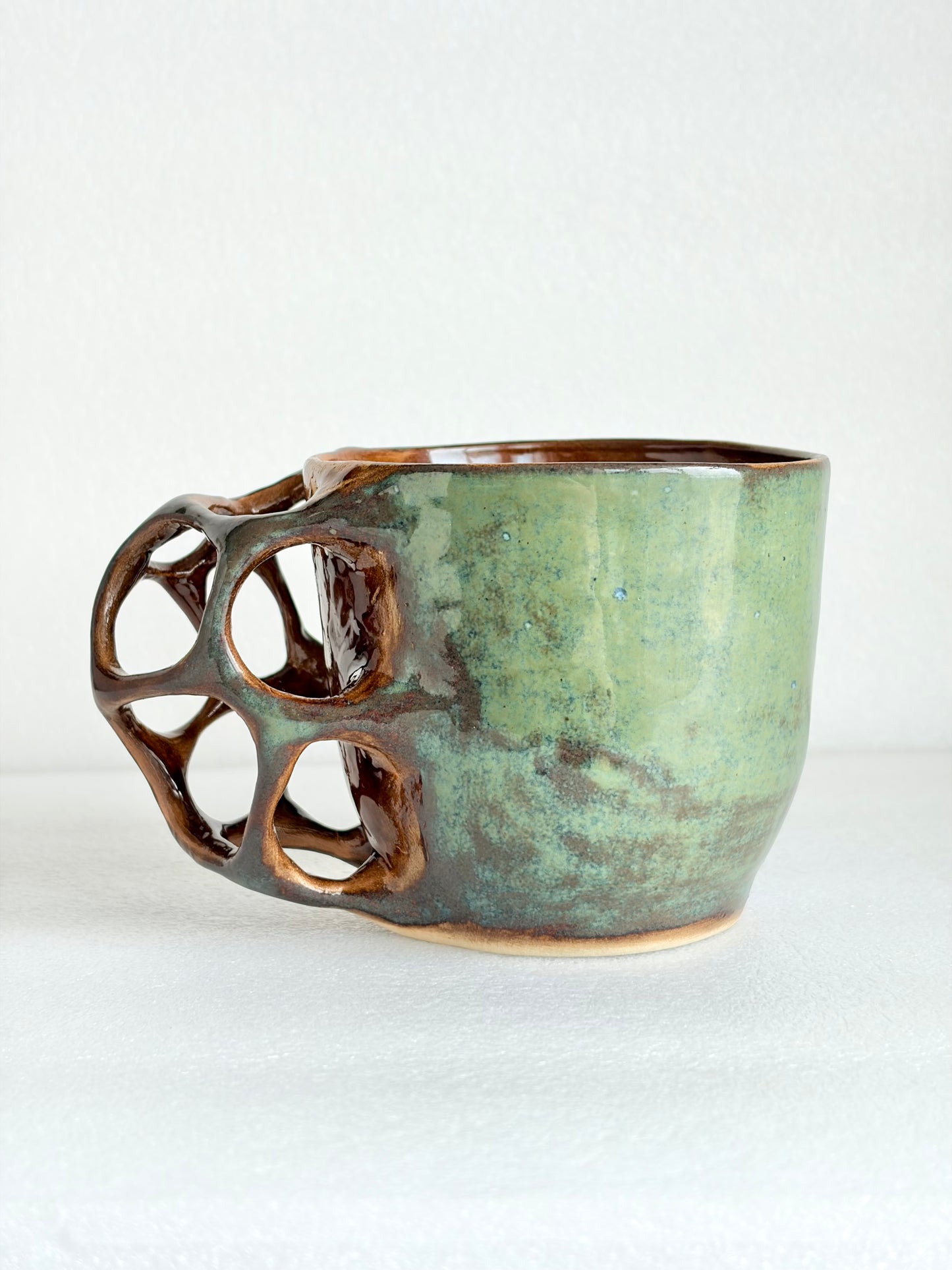 Kubek ceramiczny „Tripto” zielono-brązowy
