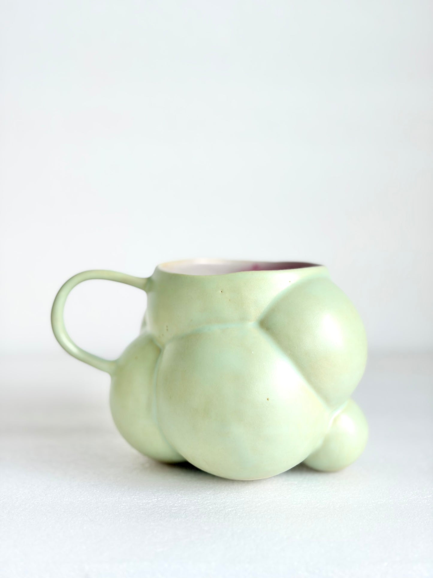 Kubek ceramiczny “Bubbles 3” zielono-różowy