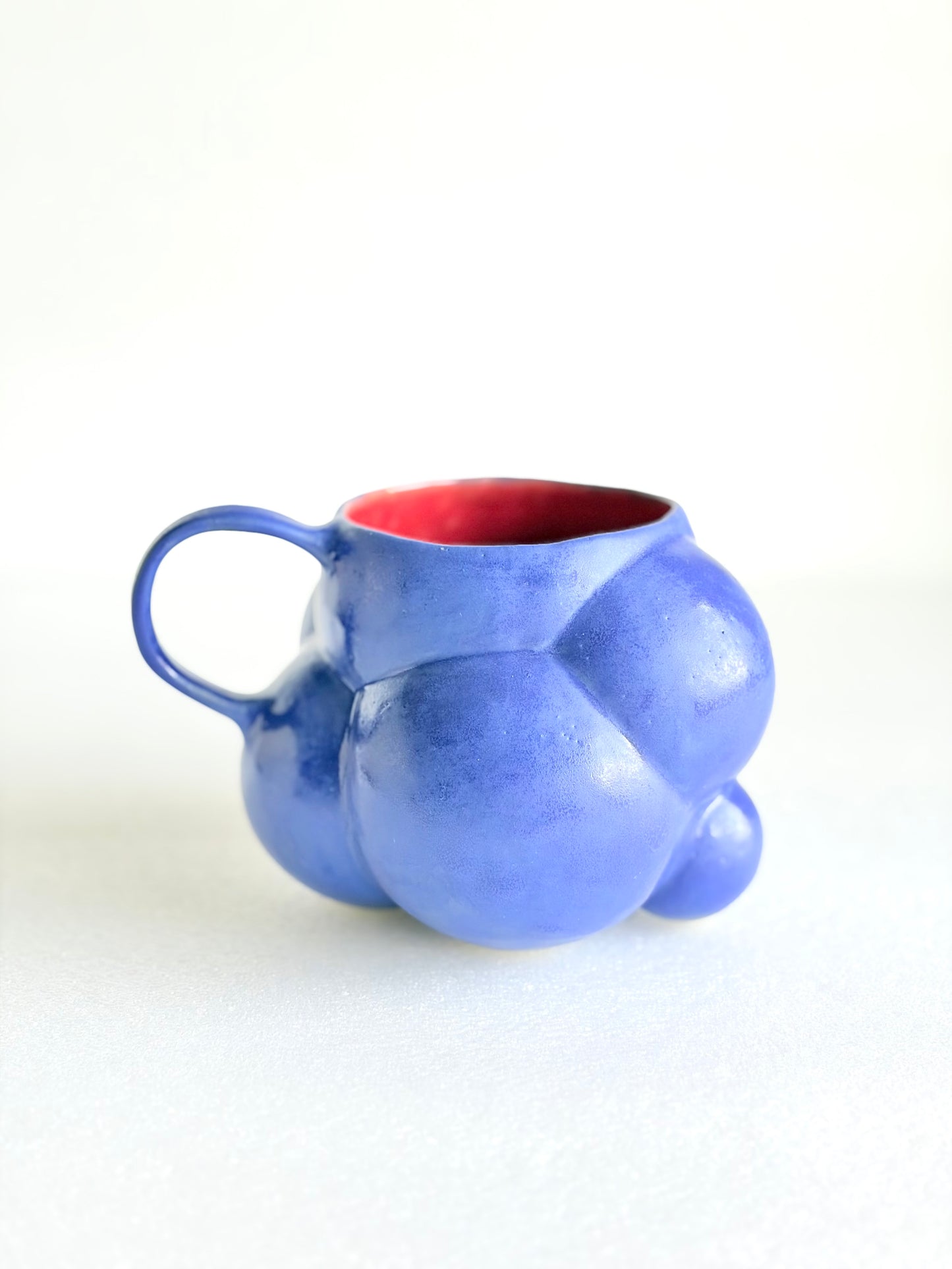 Kubek ceramiczny “Bubbles 3” granatowo-czerwony (Copy)