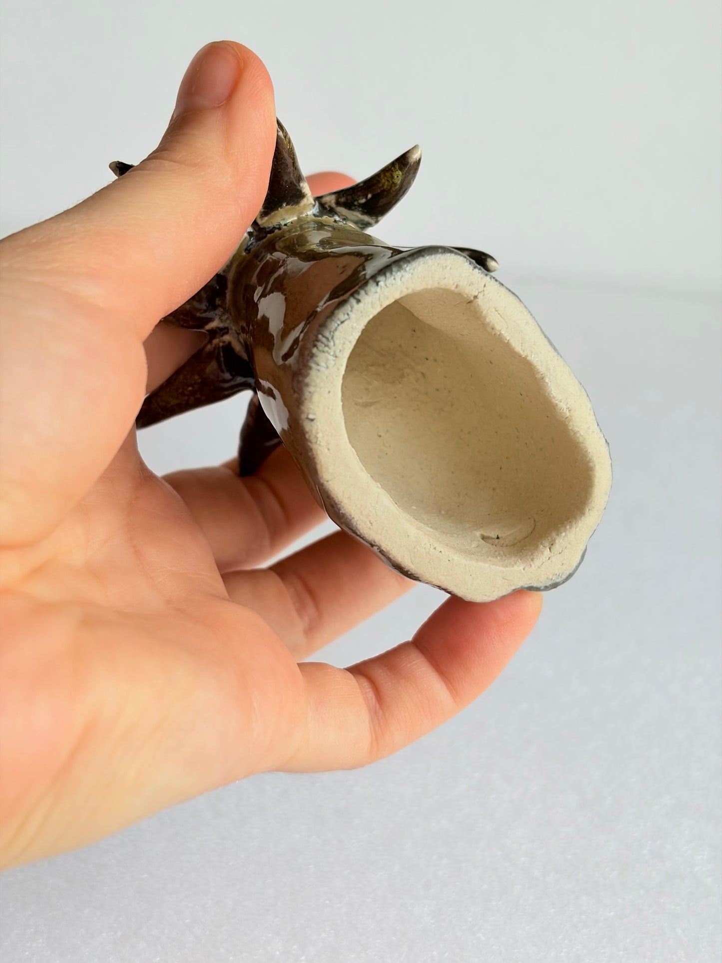 Figurka ceramiczna kot gwiazda