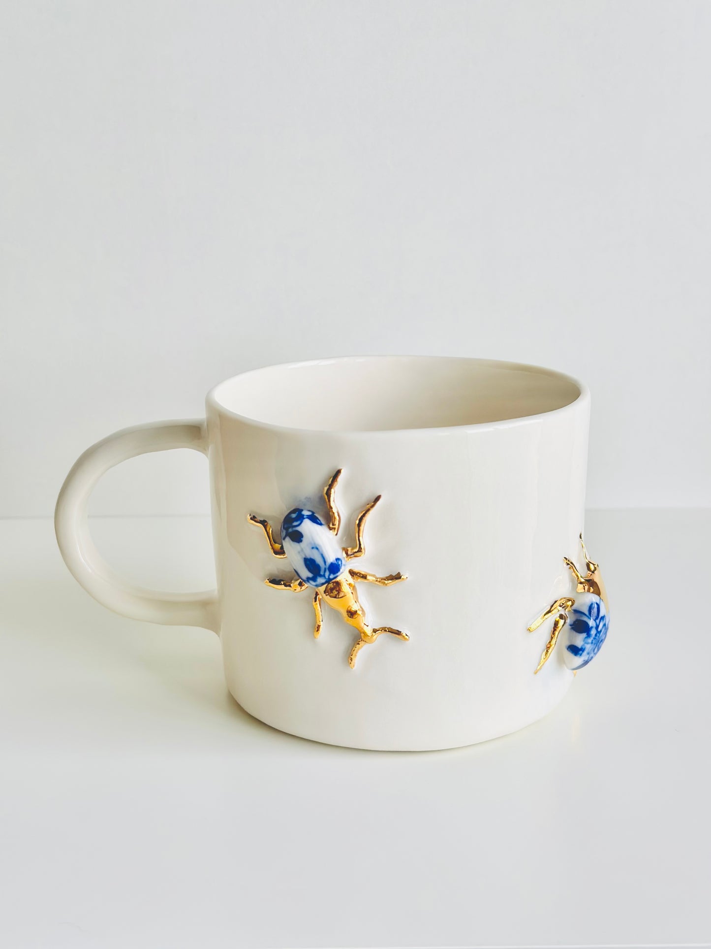Mug en porcelaine plaqué or
