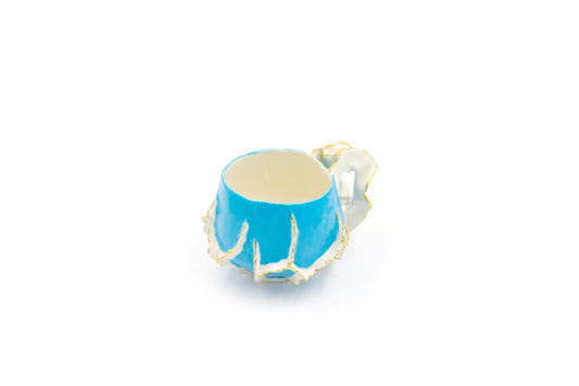 Mug en porcelaine bleue et plaqué or