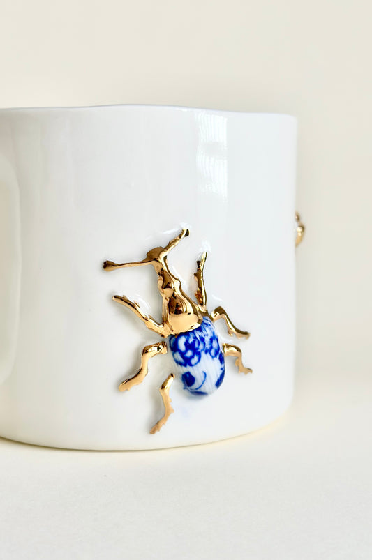 Kubek porcelanowy z żukami