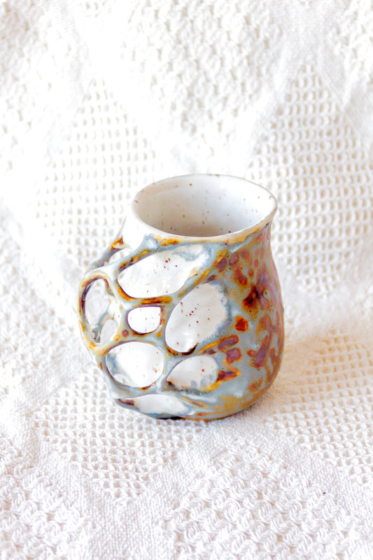 Mug en céramique orange et beige